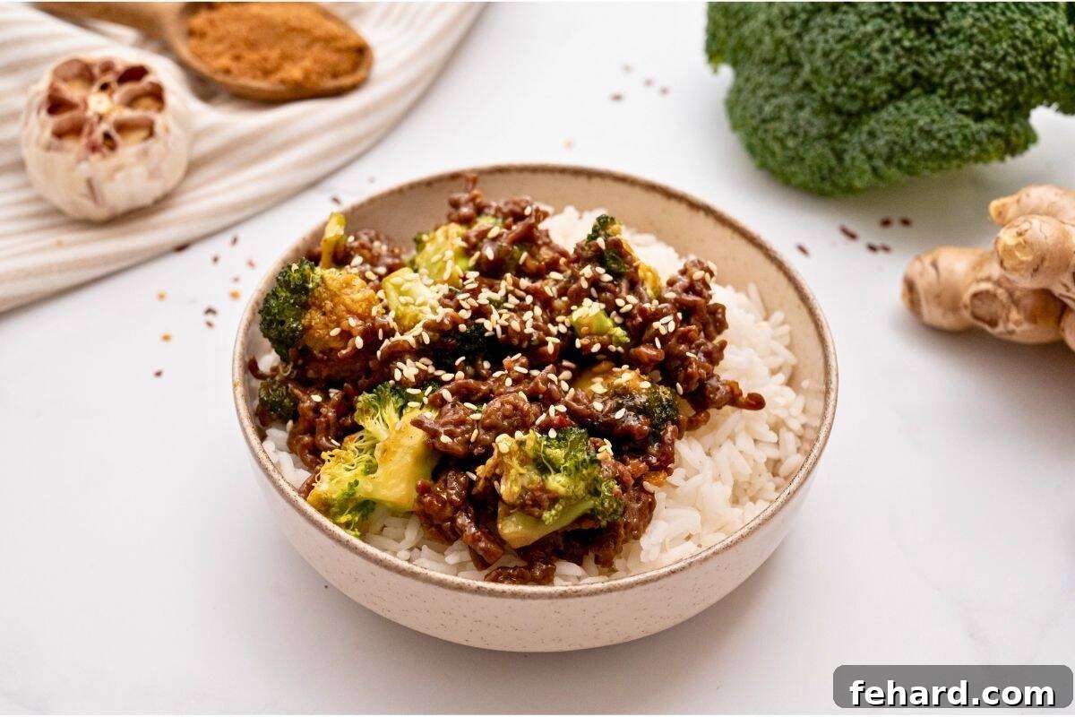 Ground beef with crisp tender broccoli tossed with sweet and savory sauce served over white rice topped with sesame seeds.