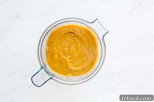 Comforting Carrot Leek Soup 13 Soup in a blender, pureed.