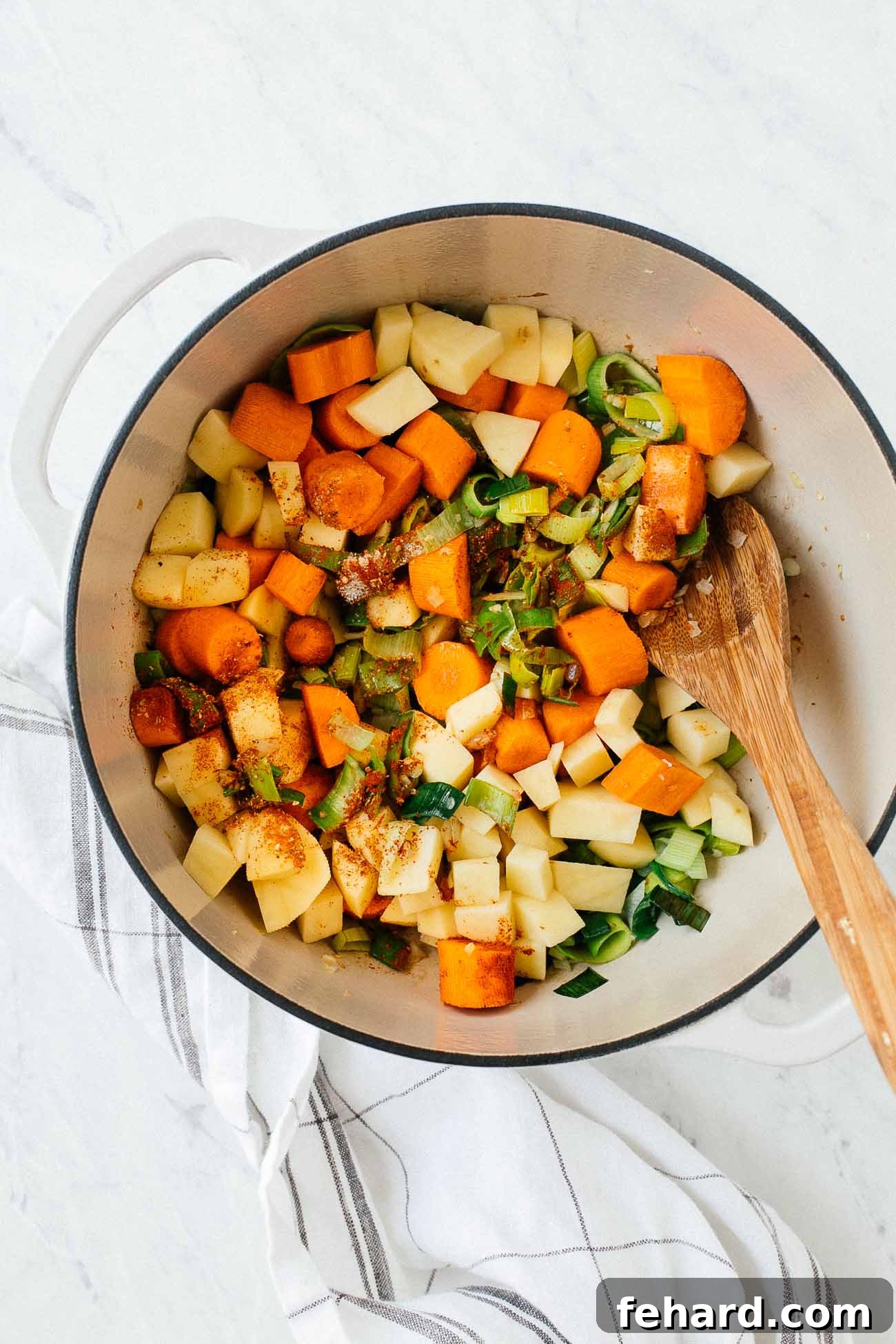 Comforting Carrot Leek Soup 5 Sautéing vegetables in a dutch oven.