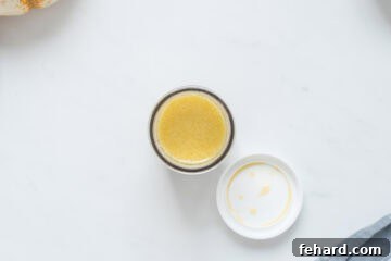 Apple cider vinaigrette in small ball jar.