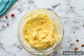 Sugar cookie dough in large mixing bowl.