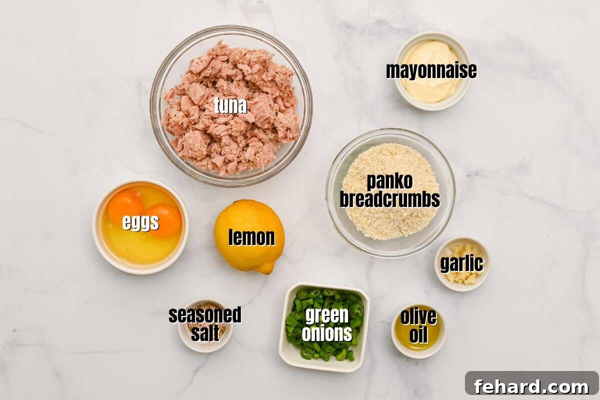Ingredients for Tuna Cakes on White Board labeled.