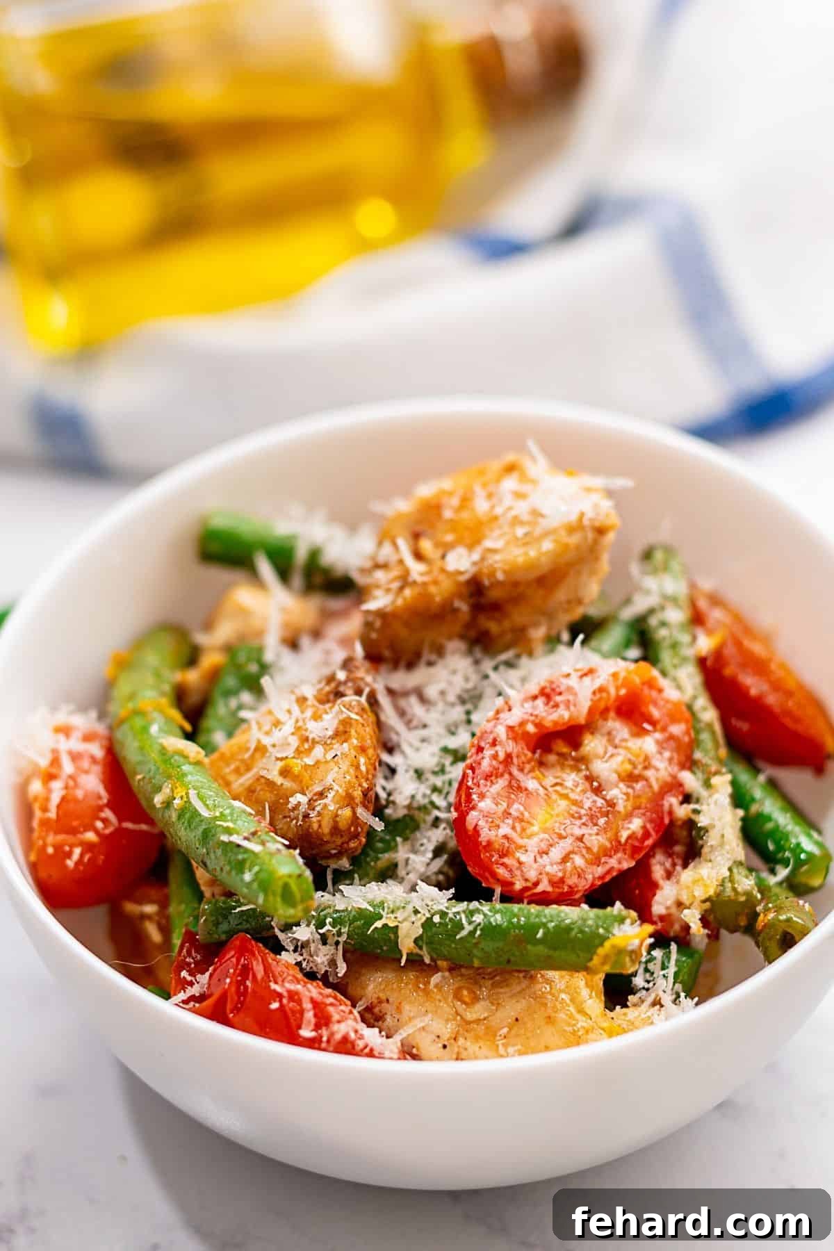 Chicken and Green Bean Skillet recipe Final A perfectly portioned bowl of Chicken and Green Beans with cherry tomatoes, ready to be enjoyed.