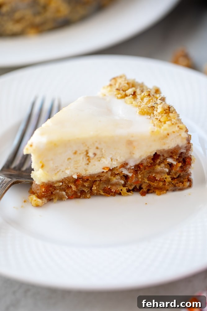 Carrot Cake Cheesecake slice on white plate