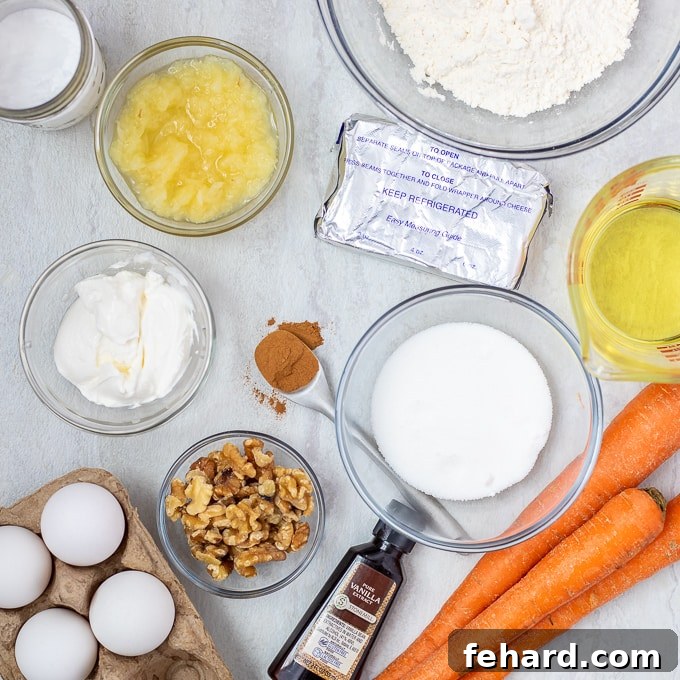 Ingredients for Carrot Cake Cheesecake on white counter