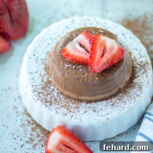 Velvet Dark Chocolate Delight 2 Chocolate Panna Cotta on white platter with strawberries