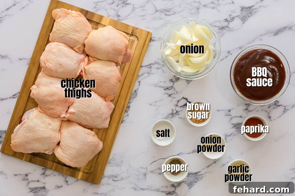 Slow Cooker Chicken Thighs Recipe Ingredients All the ingredients for slow cooker BBQ chicken thighs laid out on a kitchen counter.