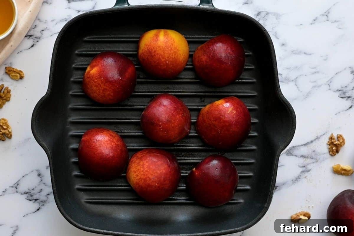 Best Grilled Peaches: Direct Heat Application for Flavor Peach halves, flesh side down, cooking on a hot grill pan, with steam gently rising.