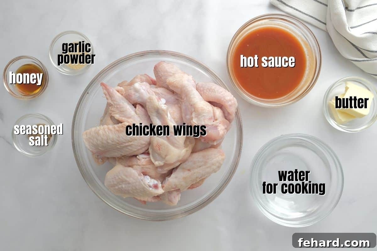 Ingredients for instant pot chicken wings labeled on counter.