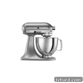 A stylish grey KitchenAid Stand Mixer, a baking staple for aspiring and professional bakers alike.