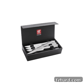 A comprehensive Zwilling Knives Set displayed in an elegant black box, featuring high-quality, durable blades.