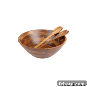 A beautifully crafted wooden salad bowl set, ideal for elegant serving and dining.