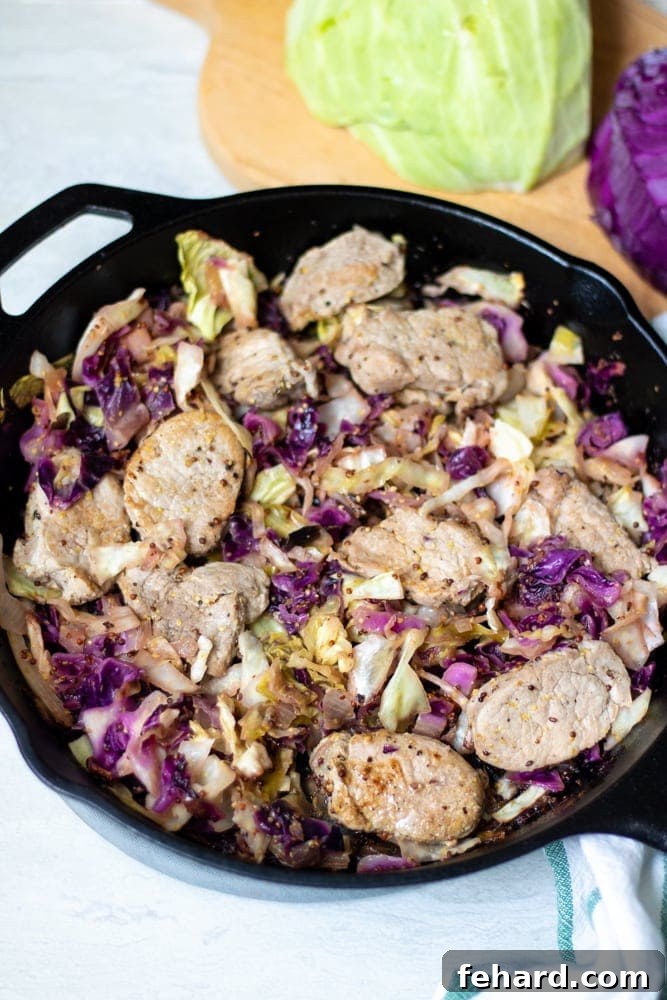 Pan Seared Pork Tenderloin Cast Iron Skillet with Skillet Pork Tenderloin Chops and Cabbage next to fresh cabbage