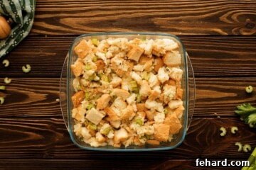 Bread stuffing spread in a baking dish.