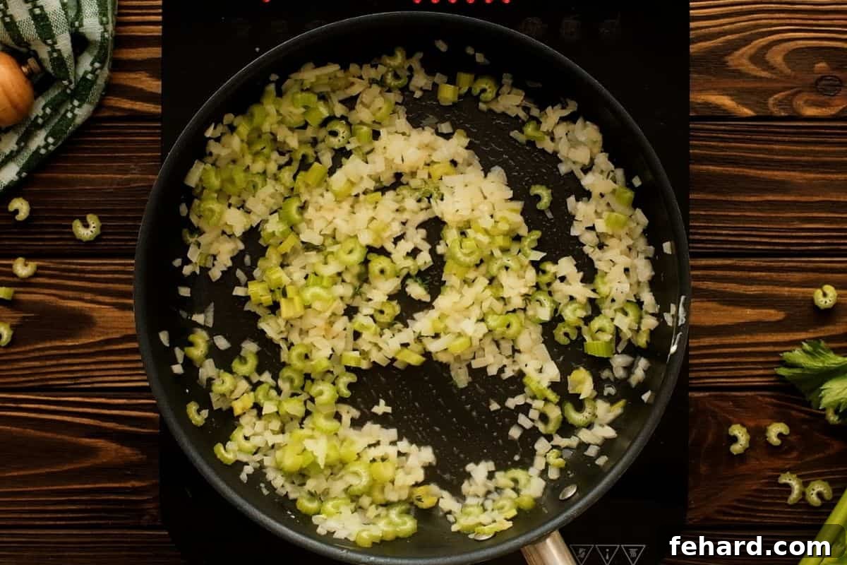 Stuffing Vegetable Base Minced onions and chopped celery gently sautéing in melted butter in a skillet.