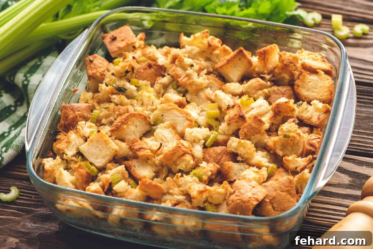 Baked Homemade Stuffing Baked bread stuffing in a large baking dish, golden and lightly crisp on top.