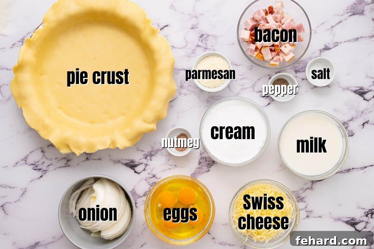 Ingredients for quiche lorraine laid out on a kitchen counter: pie crust, bacon, onions, Swiss cheese, Parmesan, eggs, cream, milk, salt, pepper, and nutmeg.
