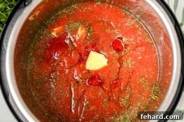 Fast & Flavorful Instant Pot Spaghetti 7 Ingredients for Instant Pot Spaghetti Sauce layered inside inner pot of Instant Pot.