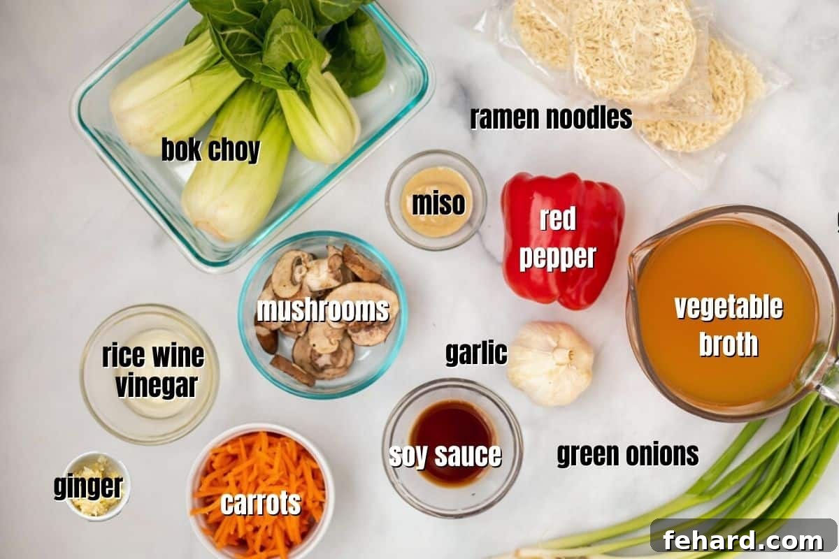 Easy Ramen Recipe A selection of fresh ingredients neatly arranged on a kitchen counter, showcasing the components needed to make delicious homemade ramen.