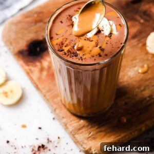A vibrant close-up of the delicious Chocolate Peanut Butter Smoothie, perfectly blended and ready to enjoy.