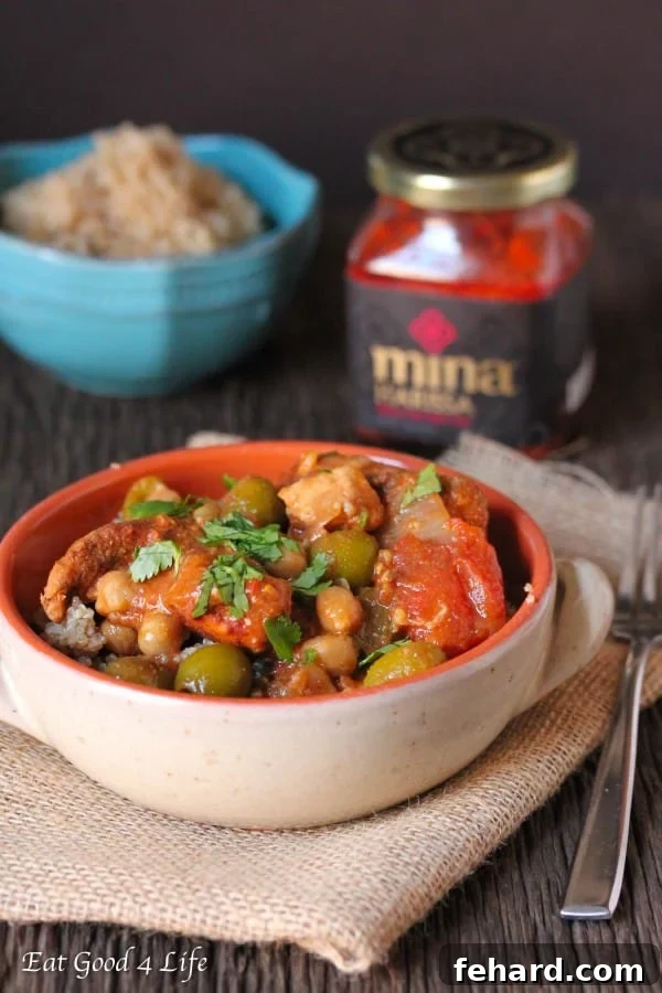 slow cooker Moroccan chicken with colorful vegetables and aromatic spices.