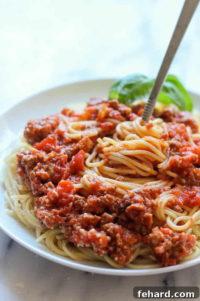 slow cooker spaghetti sauce in a pot, rich and thick, ready to be served over pasta.