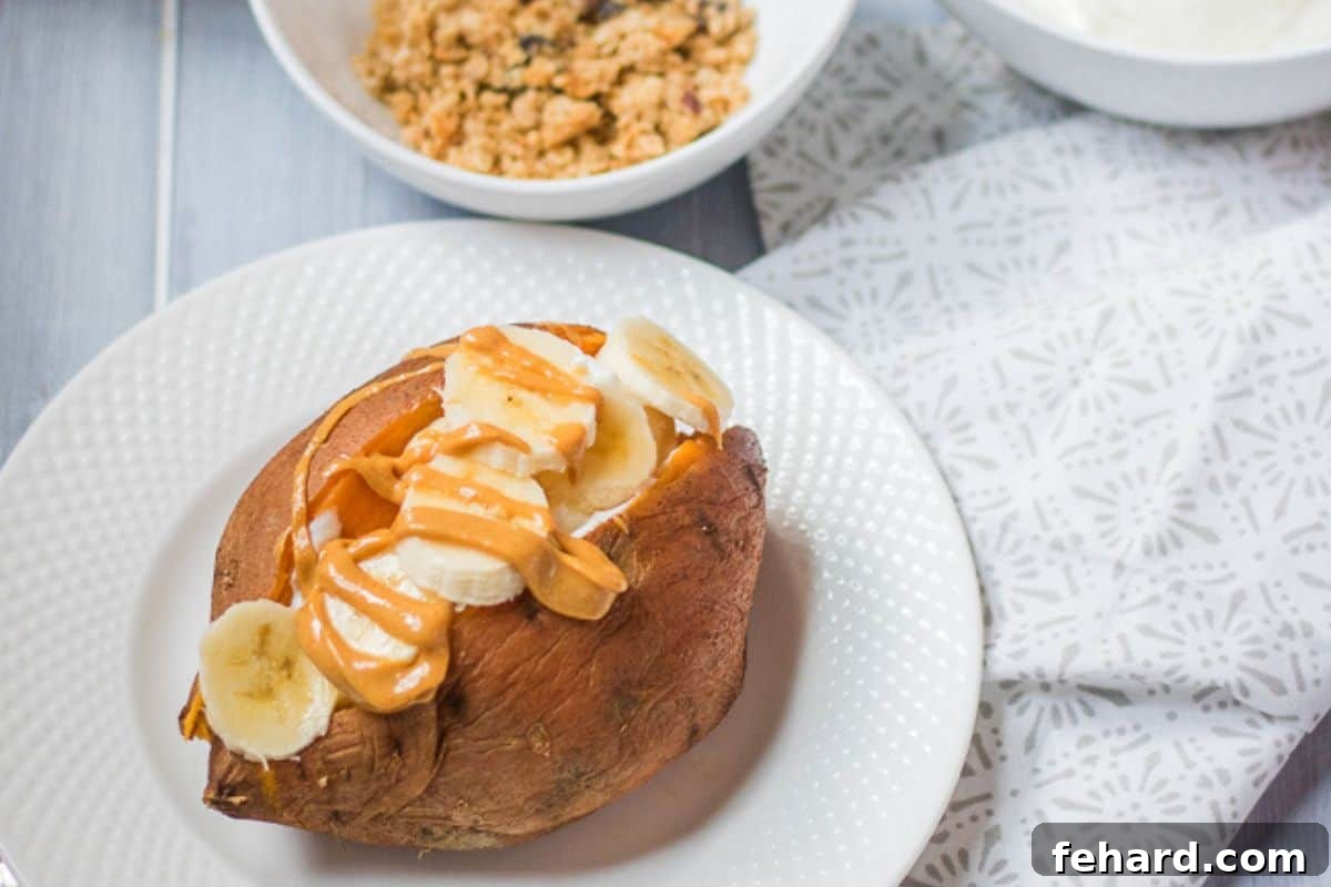 Sweet Potato with Sweet Toppings A beautifully baked sweet potato, split open and generously adorned with creamy sliced banana and a rich, golden drizzle of nut butter. A simple and appetizing sweet breakfast sweet potato.