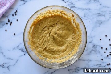 The Legendary Billion-Dollar Cookie Recipe 5 Creamed eggs, butter, and sugar in a large mixing bowl.