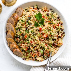 Quinoa salad in a large, white serving bowl.