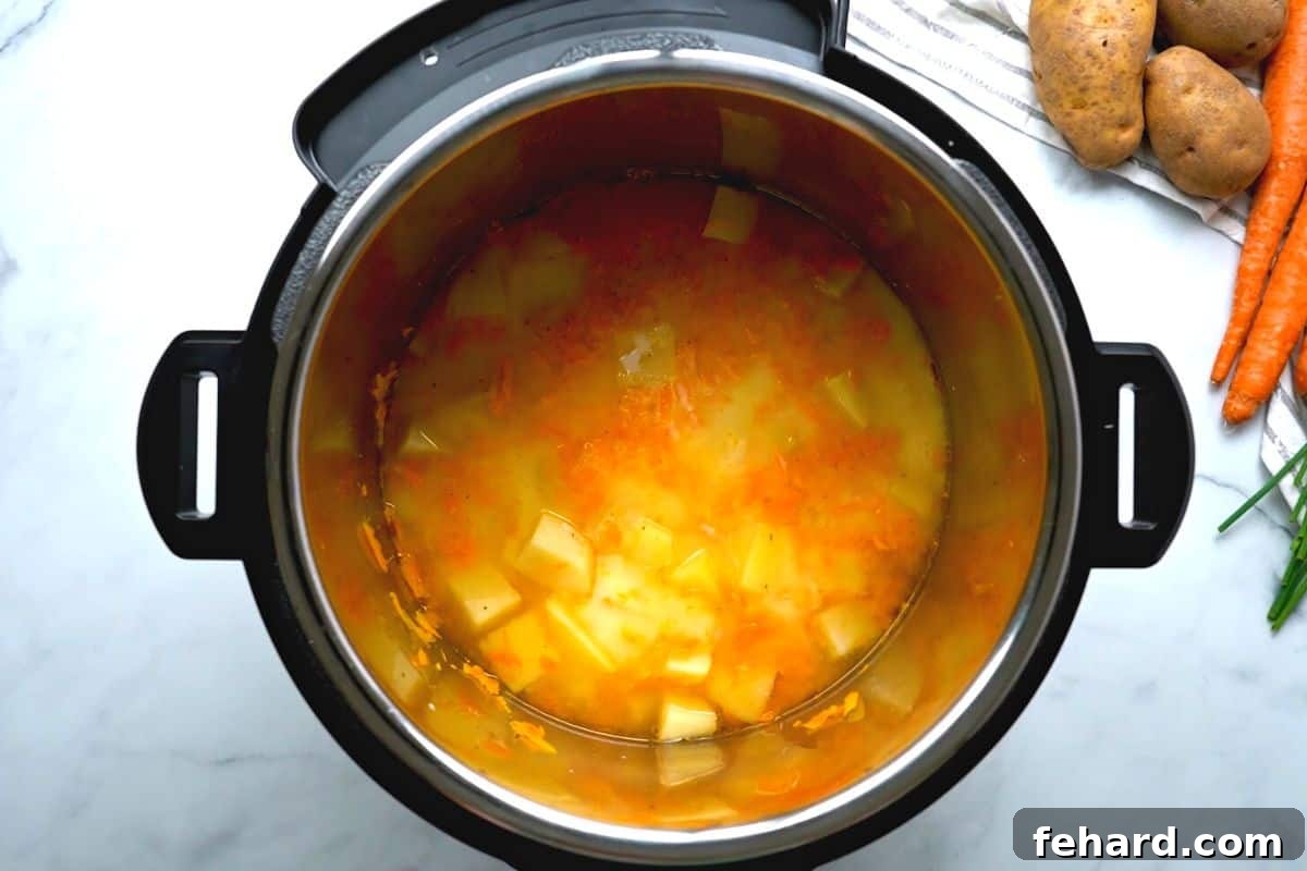 Baked Potato Soup Instant Pot Pressure Cooked Baked Potato Soup inside instant pot.