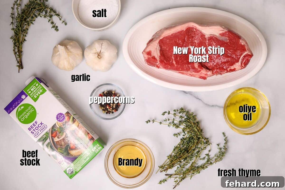 Neatly arranged ingredients for New York Strip Roast and Au Jus on a kitchen counter, clearly labeled.