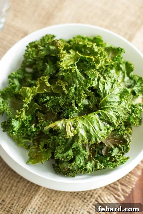 How to Make Spicy Kale Chips - A Crispy Snack Plate of spicy kale chips, perfectly crispy and golden brown