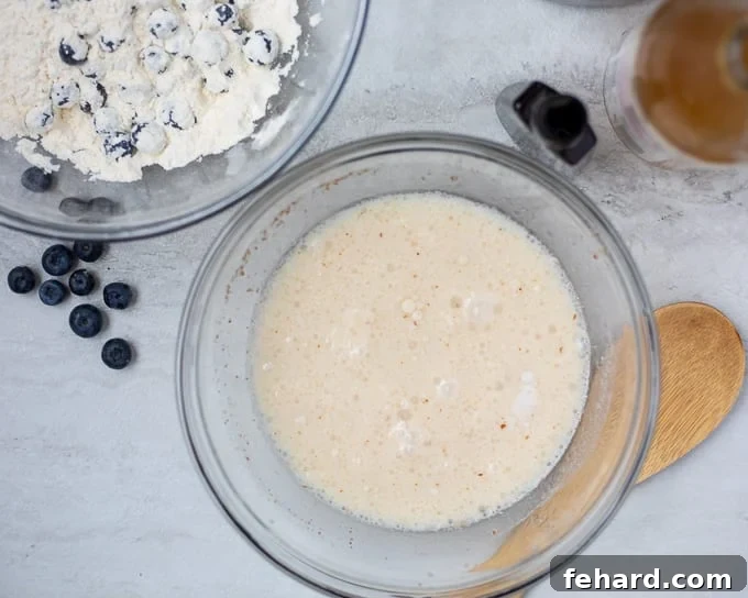 Egg Free Wet Ingredients for eggless pancakes in mixing bowl.
