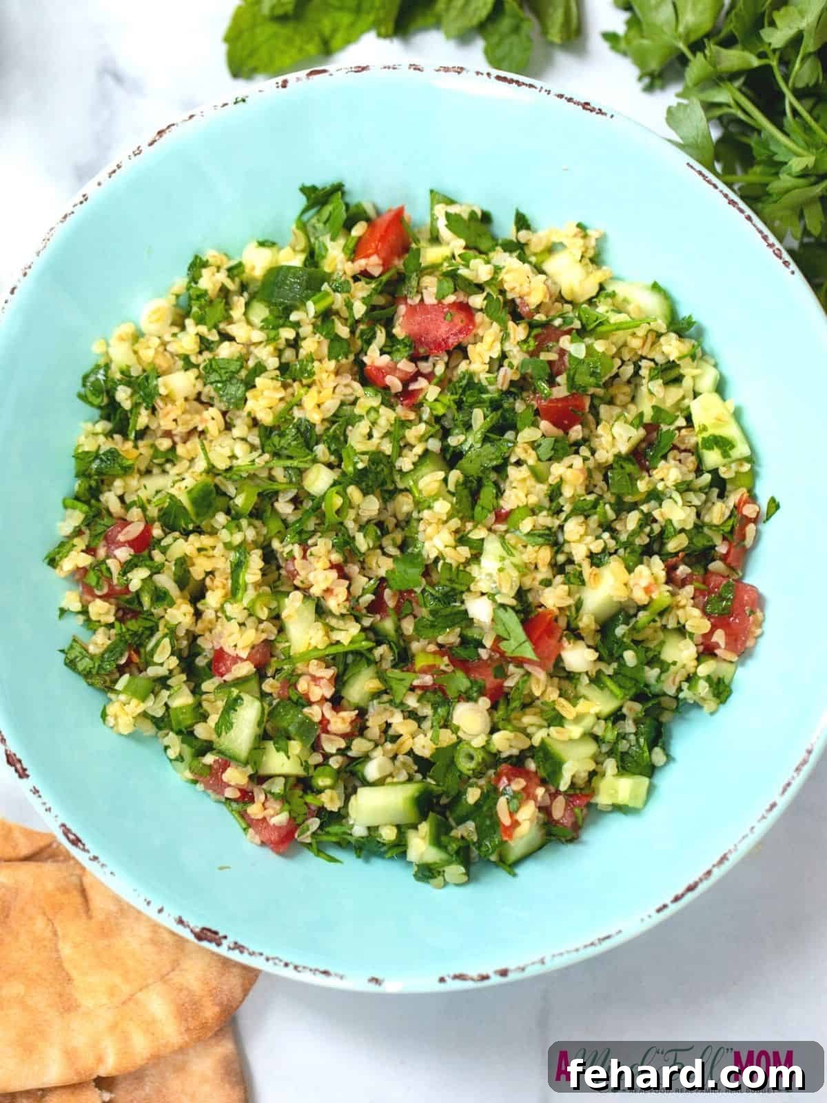 Tabbouleh in blue serving bowl.