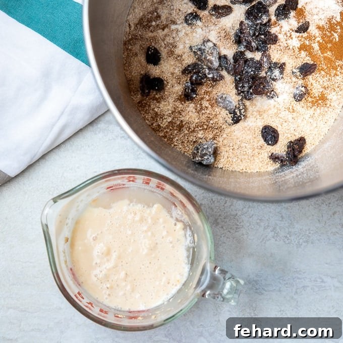 How to make homemade bread Yeast mixture in glass measuring cup