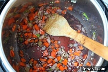 Red wine deglazing inner pot of instant pot.