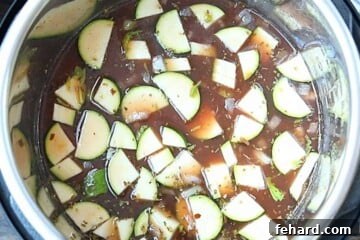 Ingredients stirred together in inner pot for Minestrone.