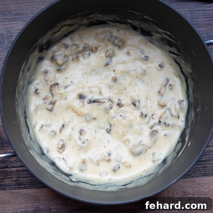 Mushroom sauce for green bean casserole in stock pan.
