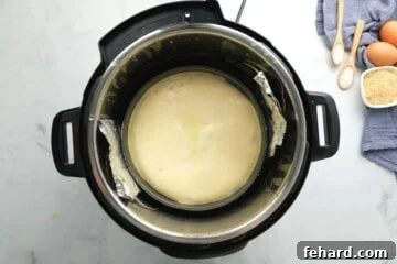 Baked Cheesecake inside inner pot of pressure cooker.