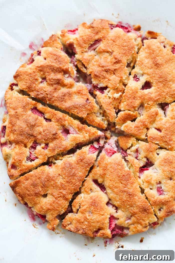 Delicious Low-Carb Strawberry Coconut Scones ready to be enjoyed, showcasing their crumbly texture and fresh fruit pieces. A perfect healthy breakfast or snack.
