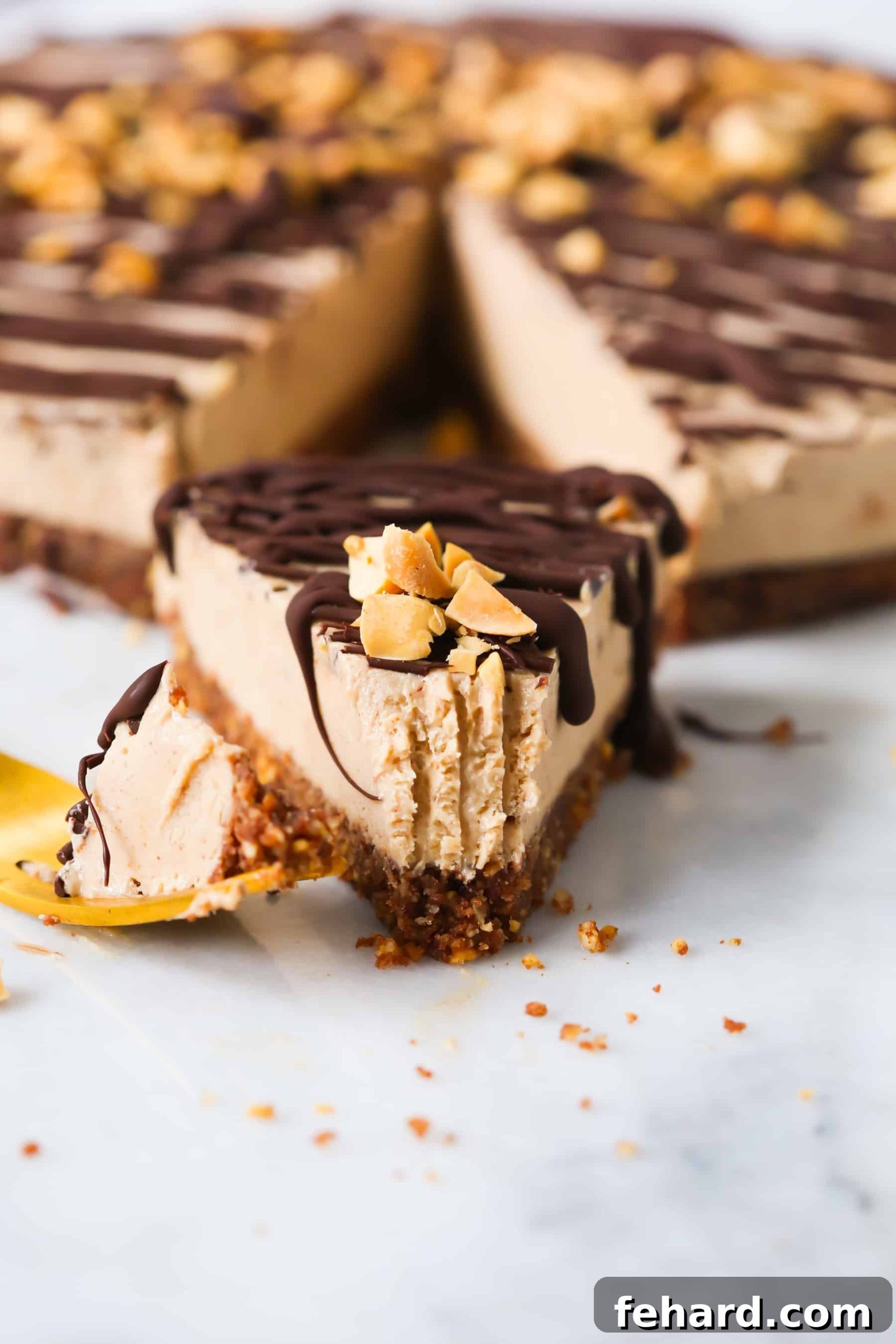 Gluten-Free No-Bake Peanut Butter Pie - Creamy, Vegan, Dairy-Free, and Easy A slice of creamy Gluten-Free No-Bake Peanut Butter Pie with chocolate drizzle and peanuts, showcasing its delightful layers.
