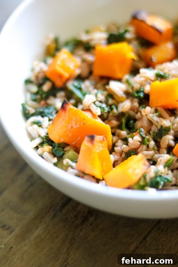 Up close of roasted butternut squash on rice salad