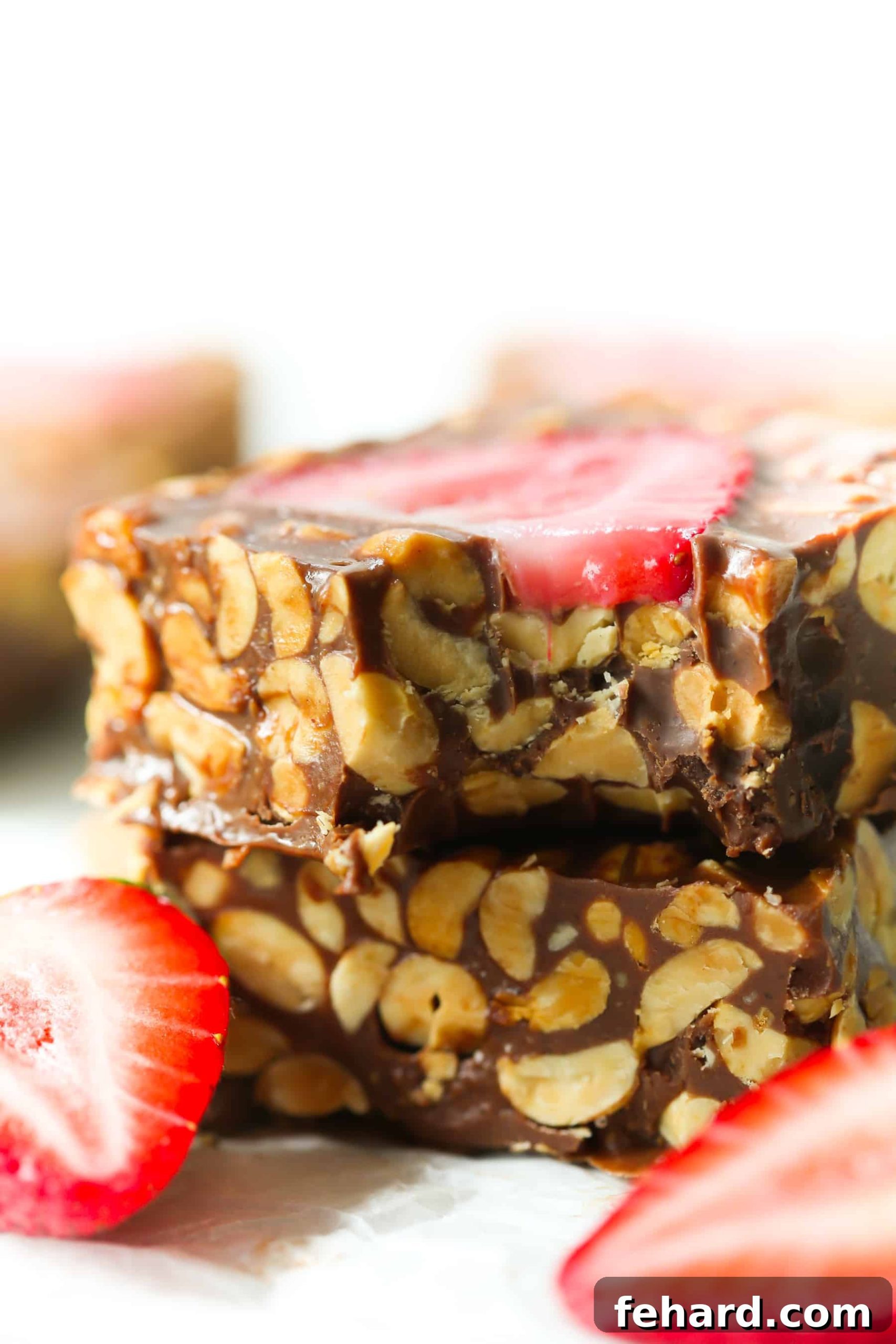 Homemade Low-Carb No-Bake Chocolate Strawberry Bars Beautifully presented no-bake chocolate strawberry bars, showcasing their layered texture and vibrant colors.