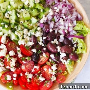 Mediterranean salad in a large bowl with dressing.