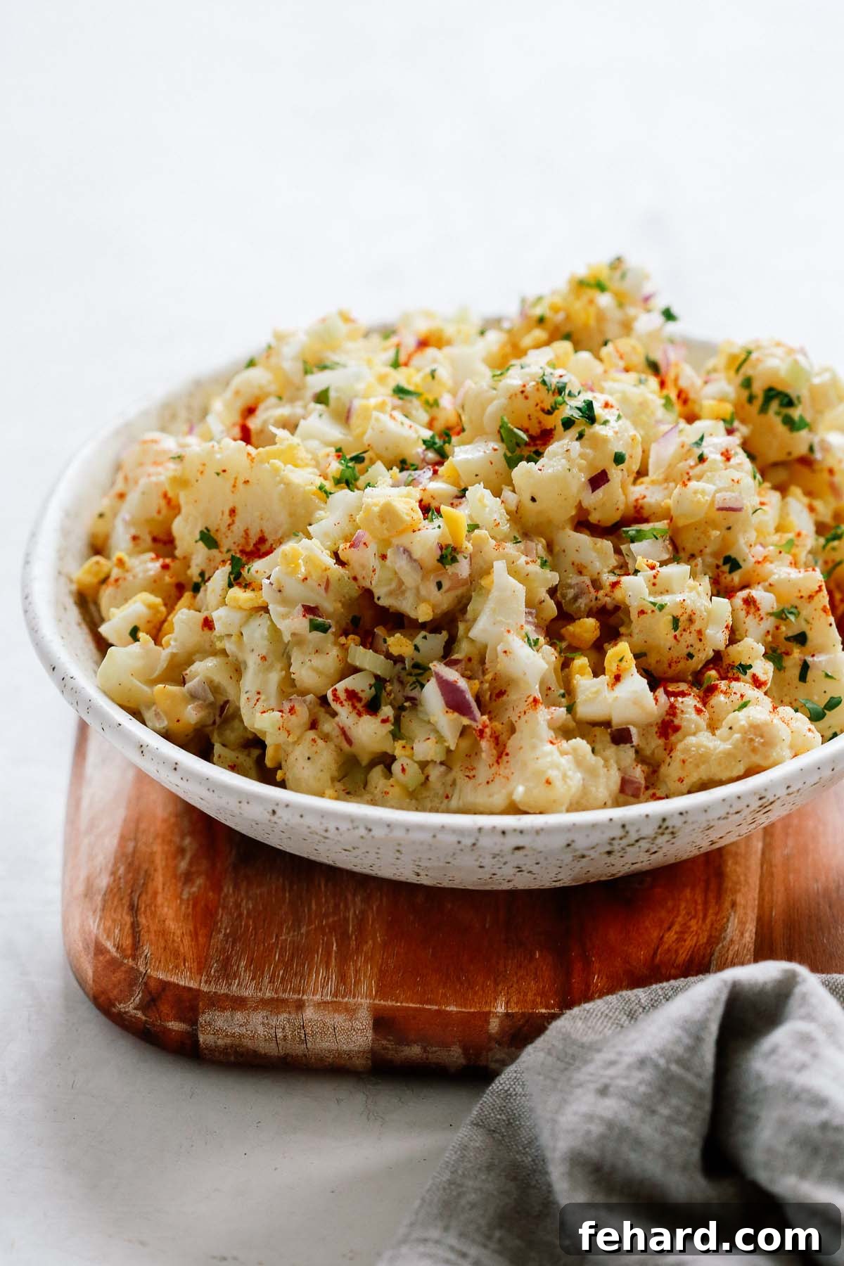 Low-Carb Cauliflower Potato Salad 7 close-up of cauliflower potato in a white bowl