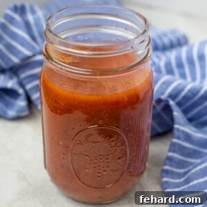 Jar of homemade enchilada sauce
