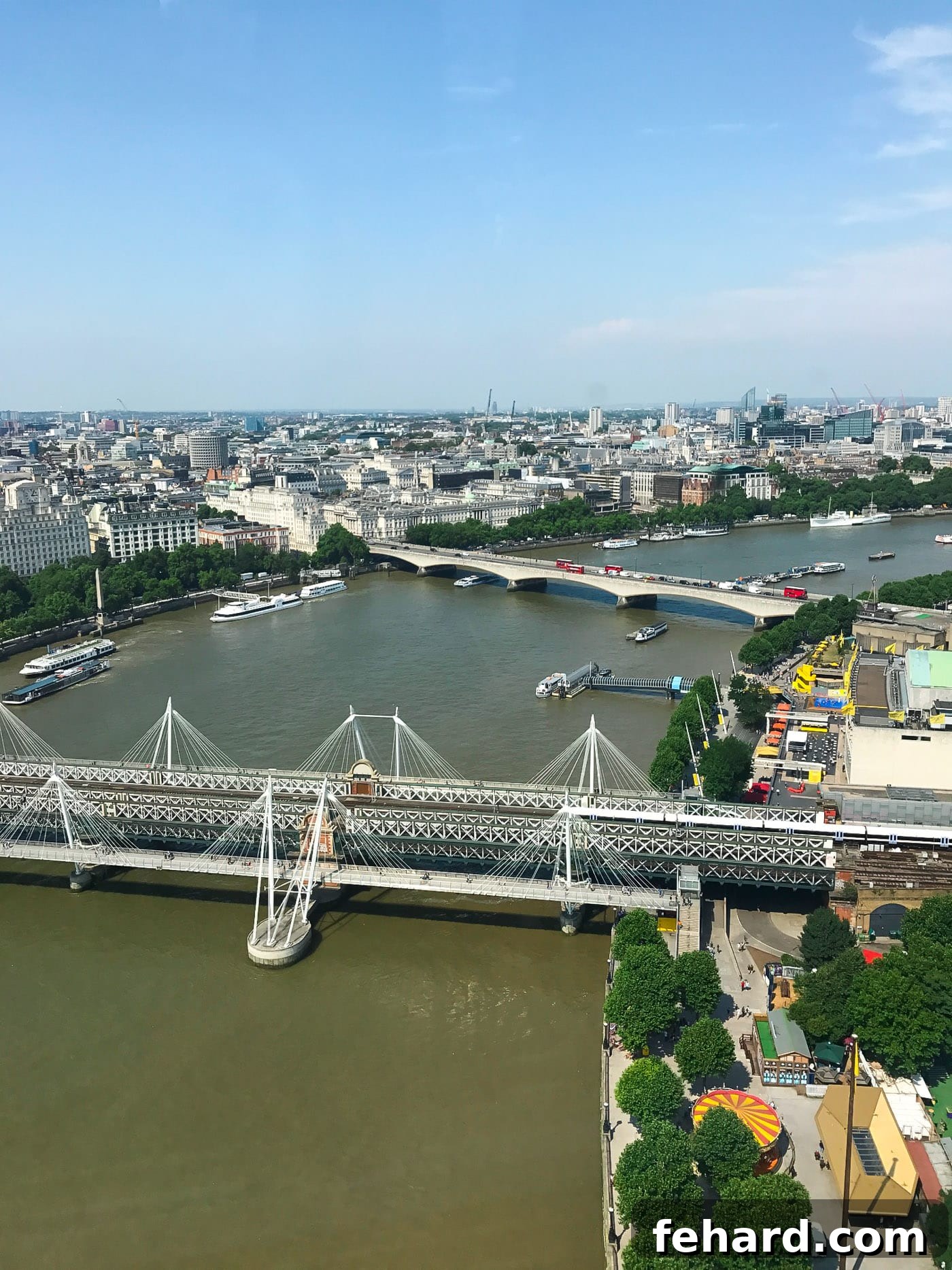 A serene panoramic view of the historic River Thames flowing through London