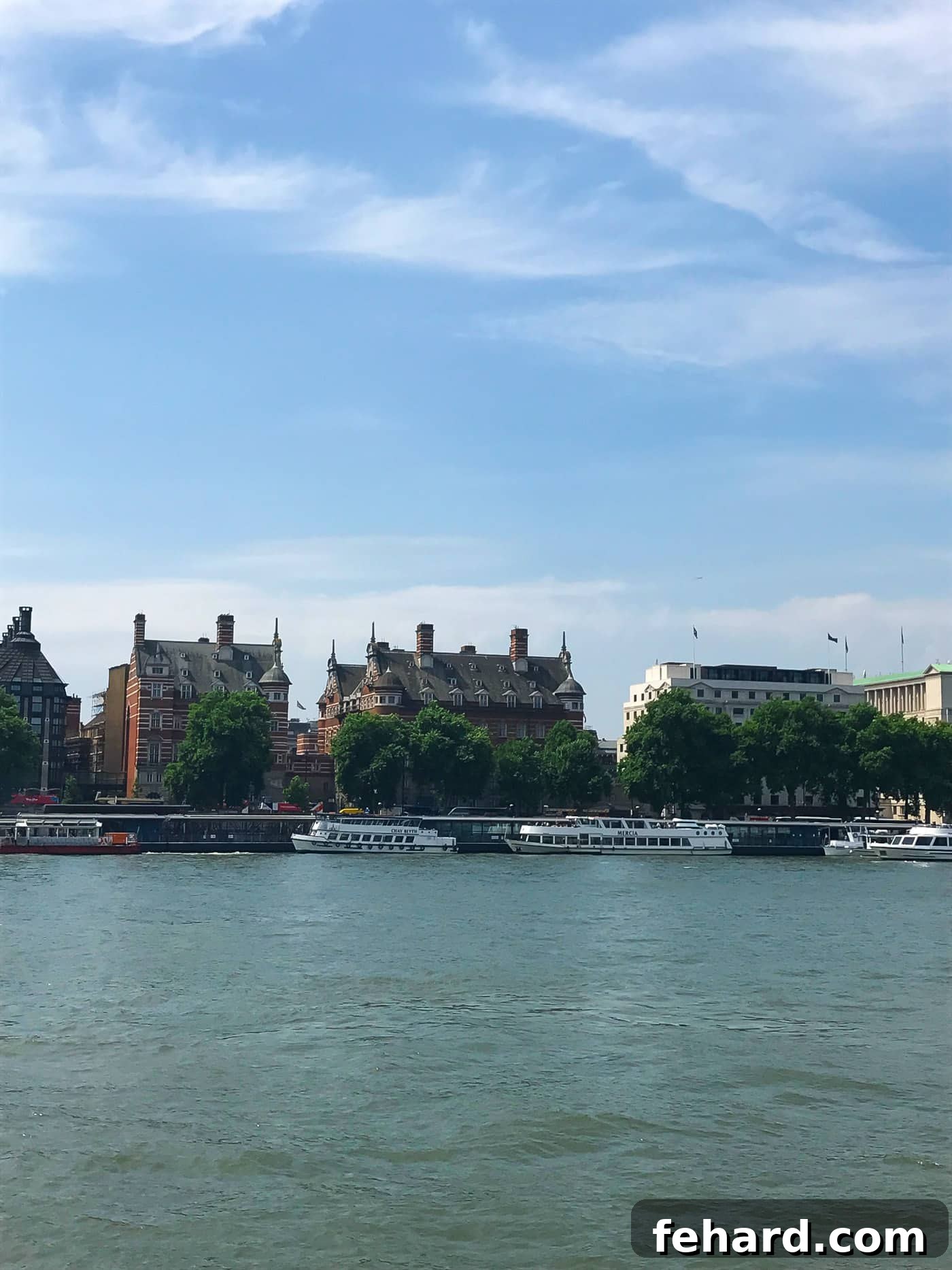 A tranquil view of the River Thames, reflecting the timeless charm of London