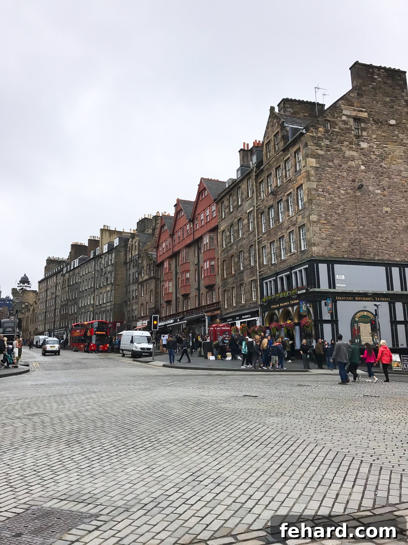 A picturesque street in Edinburgh lined with charming, historic buildings