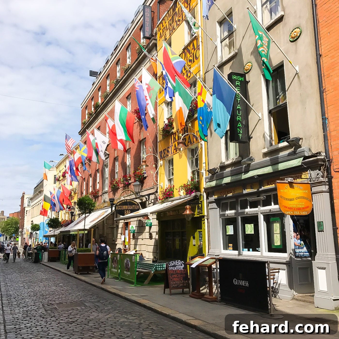 A beautiful street in Dublin adorned with colorful flags, creating a festive atmosphere
